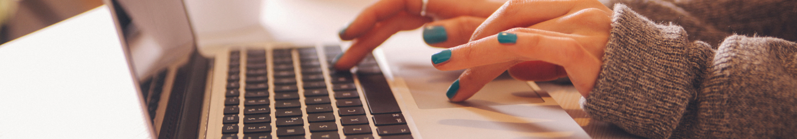 Fingers typing on a keyboard