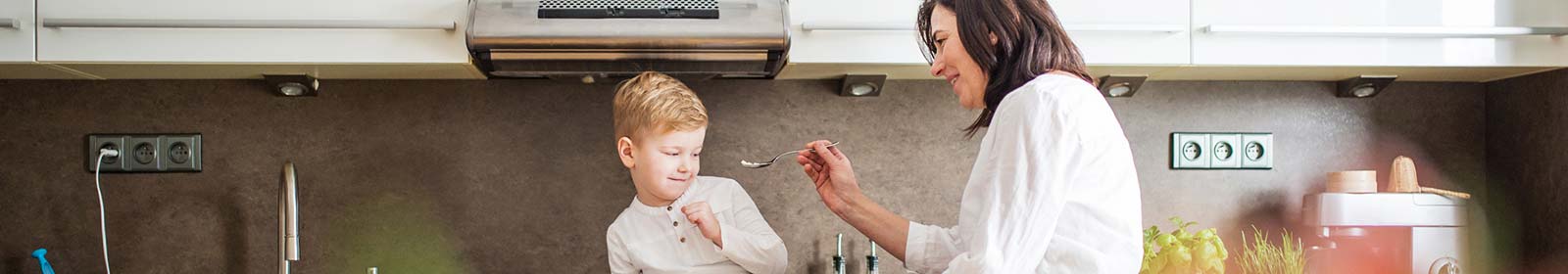 mother and son in kitchen