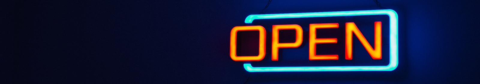 A neon OPEN sign